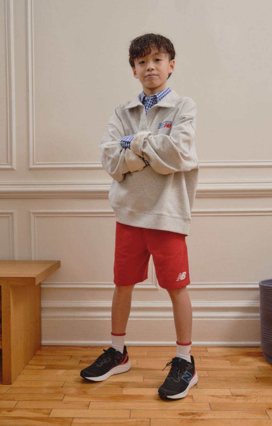 A child wearing new balance fresh foam x Arishi v4 running shoes